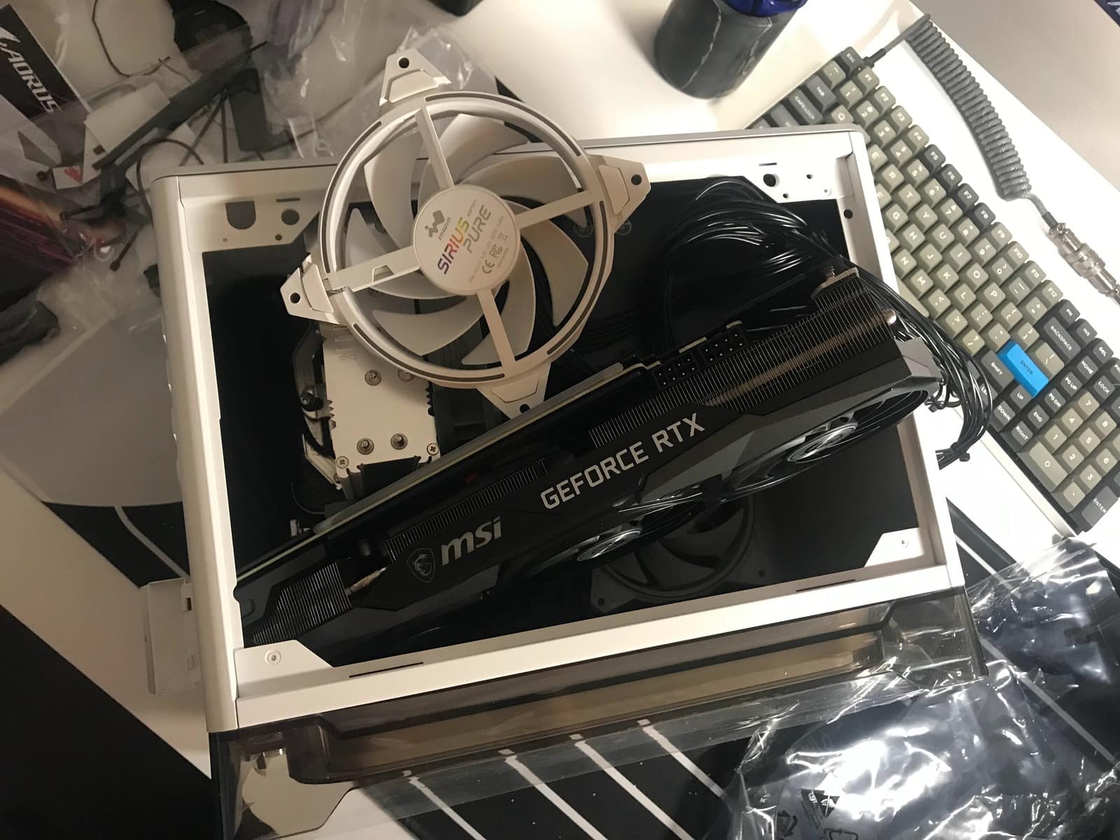 Overhead view of parts being installed in a Small Form Factor Case.